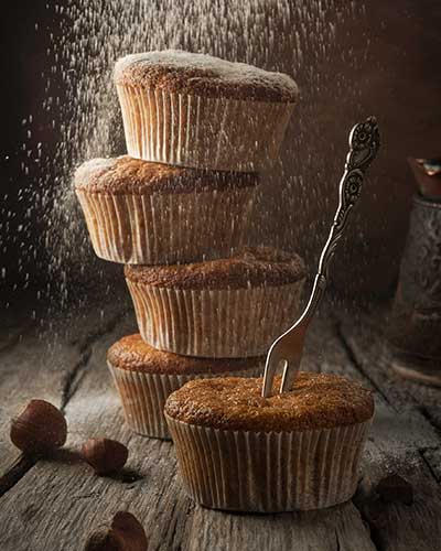 Muffins on a wooden surface